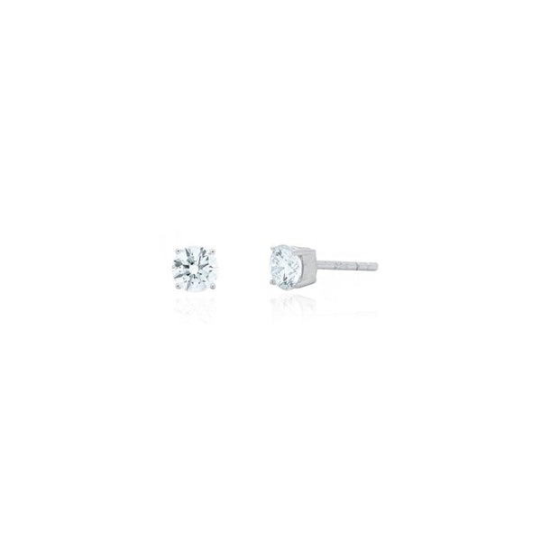 Pair of diamond stud earrings on a white background