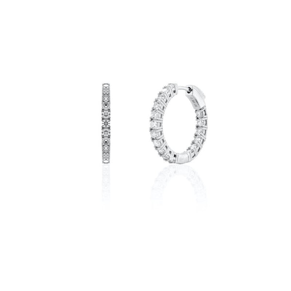 Silver hoop earrings with 1.5ct diamonds on a white background