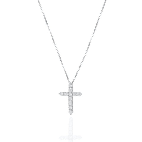 Diamond cross necklace on a white background