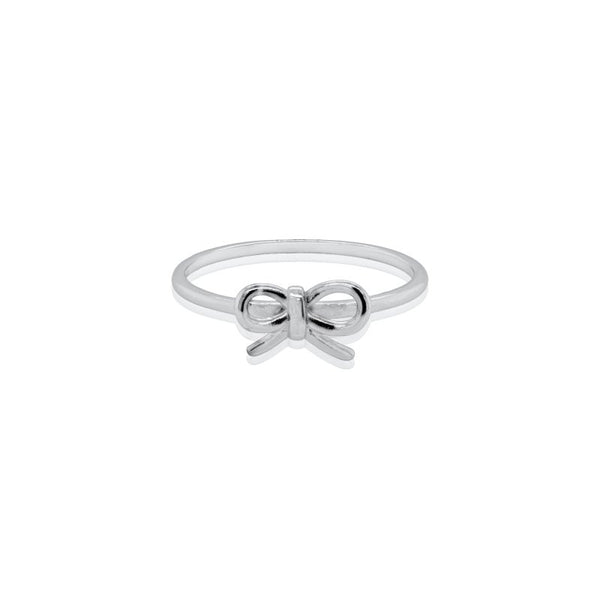 Silver bow-shaped ring on a white background