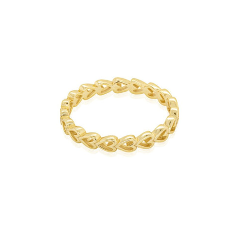 Gold ring with a braided heart design on a white background