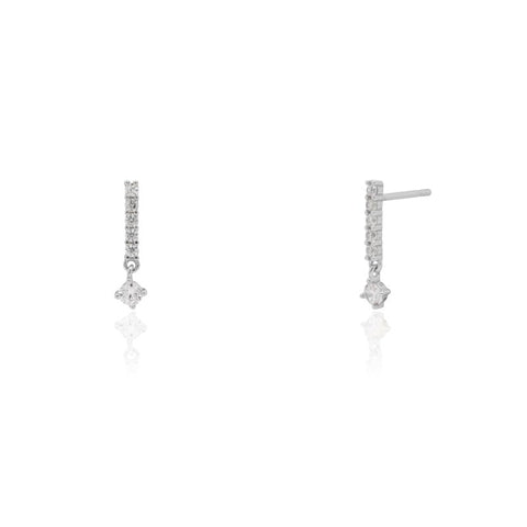 Pair of silver earrings on a white background