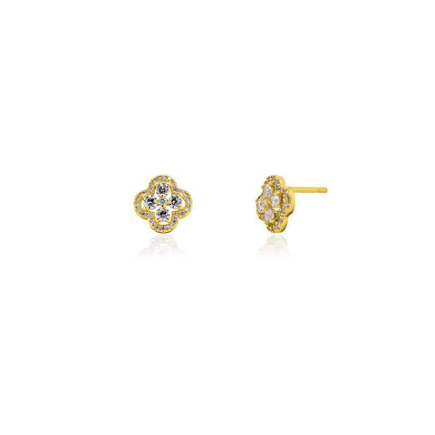 Gold earrings with diamond-like stones on a white background